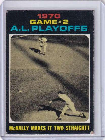 Black and white photo of player sliding into base on 1971 Topps Baseball playoffs game card