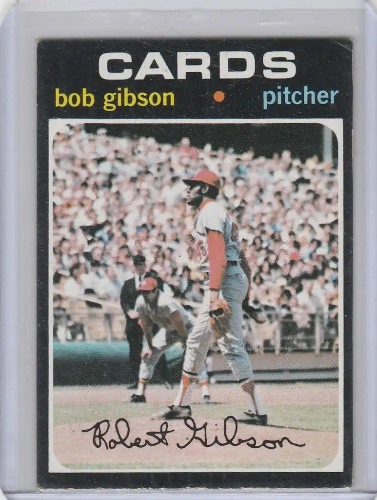 Baseball card showcasing Bob Gibson pitching for the St. Louis Cardinals EXMT Topps Baseball