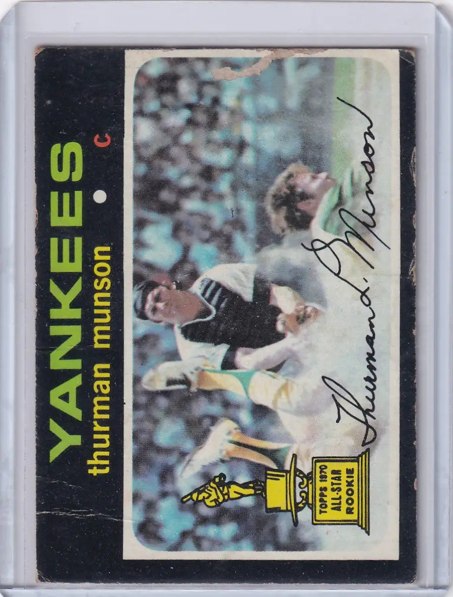 Vintage Topps Baseball card of Thurman Munson from the New York Yankees in dark uniform