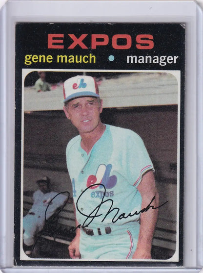 Baseball card of Gene Mauch in a light blue uniform for Topps Baseball Montreal Expos
