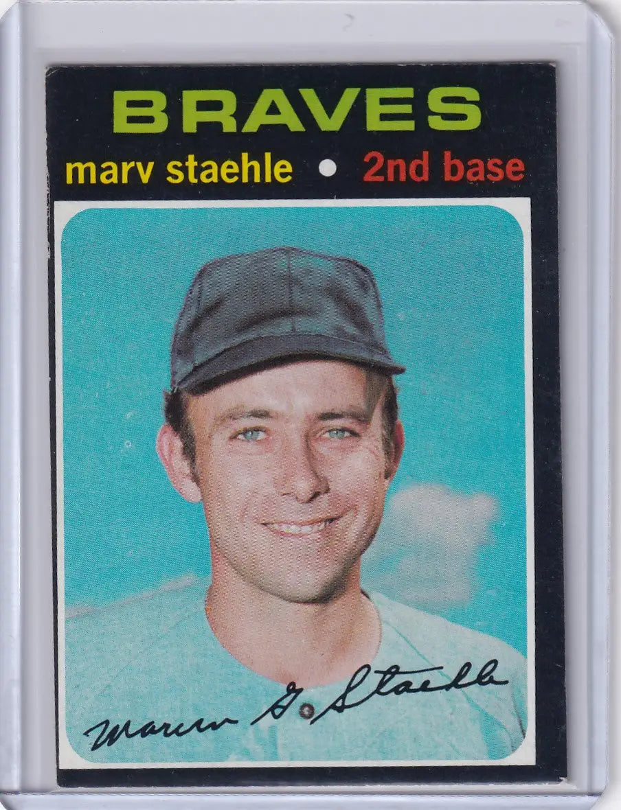 1971 Topps Baseball card of Marv Staehle smiling in Atlanta Braves cap on blue background