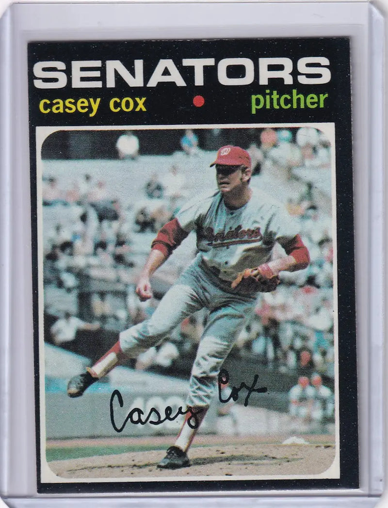 Topps Baseball card of Casey Cox pitching for the Washington Senators on the mound