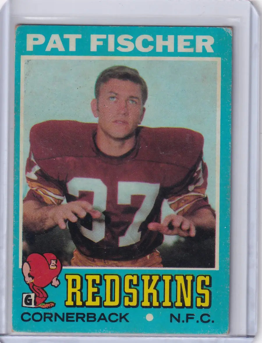 Vintage Topps Football card of Pat Fischer, Washington Redskins cornerback in burgundy jersey