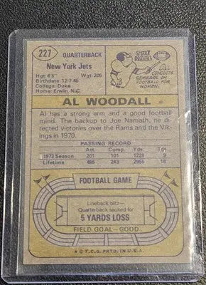 Vintage Al Woodall football card from 1974 Topps #227 featuring York Jets memorabilia
