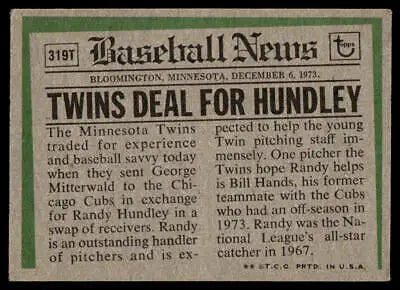 Vintage baseball news card featuring 1974 Topps 319T Randy Hundley traded