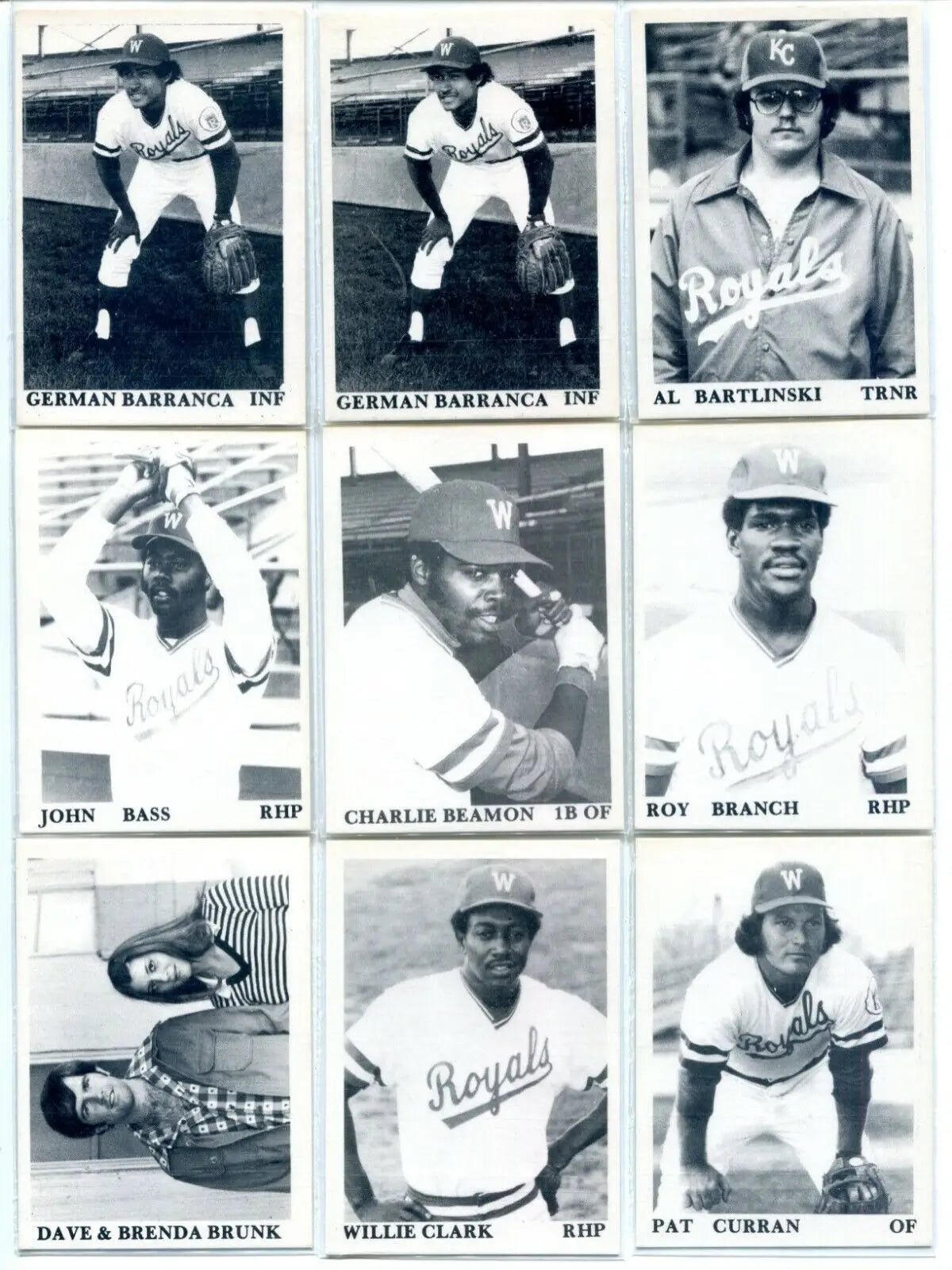 Vintage baseball cards featuring Dan Quisenberry and Willie Wilson from the 1975 TCMA set