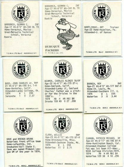 Vintage baseball cards, including Dan Quisenberry and Willie Wilson from 1975 TCMA set