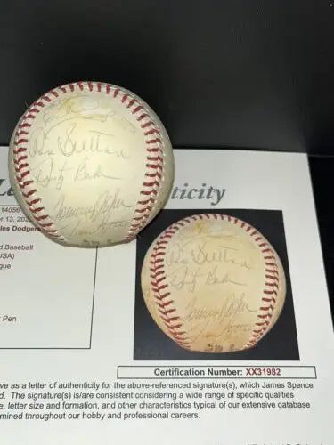 Two autographed baseballs from Dodgers history featuring Steve Garvey signatures