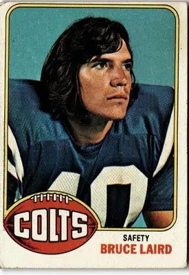 Vintage football card of Bruce Laird from 1976 Topps #111 showcasing Laird vintage football scenes