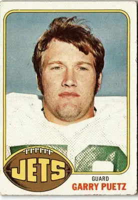 Vintage football card featuring Garry Puetz from the 1976 Topps series