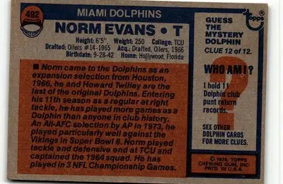 Vintage Norm Evans football card from 1976 Topps #492 featuring Miami Dolphins player