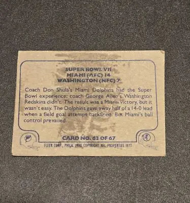 Worn 1977 Fleer Team Action Super Bowl VII football card featuring Super Bowl memorabilia