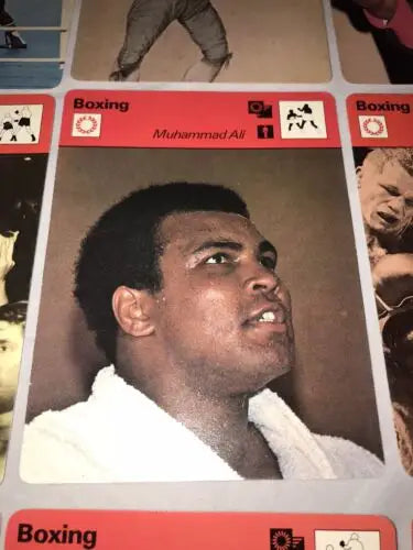Muhammad Ali boxing card in 1977 Sportscaster Boxing Lot featuring Ali Tommy Farr