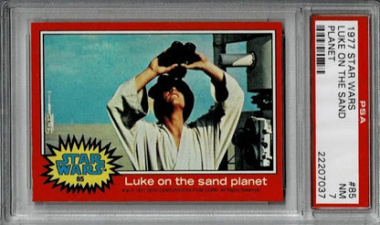 Graded 1977 Topps Star Wars Trading Card featuring Luke on the sand planet PSA 7