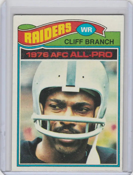 Football trading card of Cliff Branch Oakland Raiders 1976 in white helmet NRMT