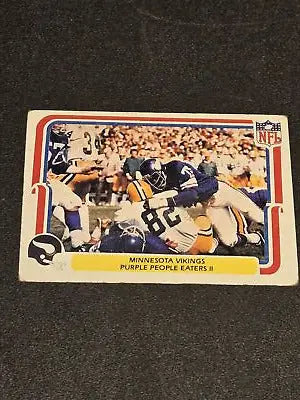 Football trading card from Fleer Team Action featuring the Purple People Eaters II