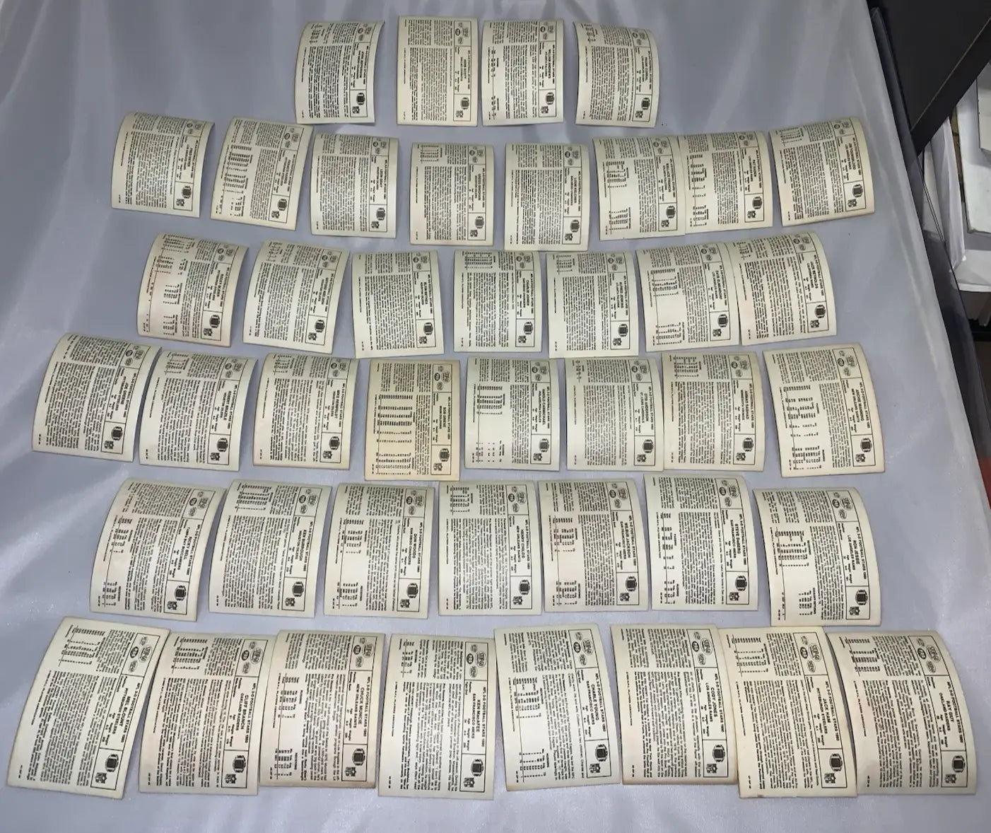 Nfl football stars partial card set featuring rectangular paper cards with text and diagrams