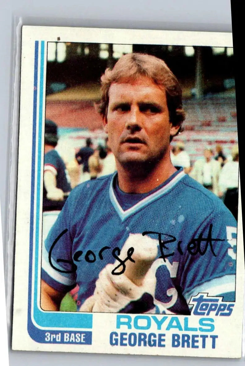 Autographed 1980s George Brett baseball card in protective sleeve for 1982 Topps #200
