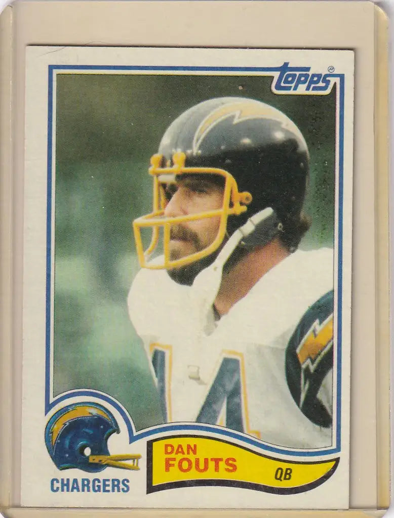 Football trading card of Dan Fouts Los Angeles Chargers in black helmet and yellow facemask