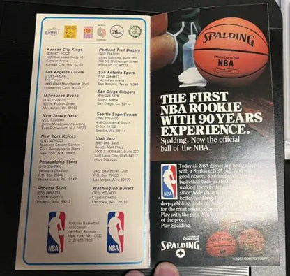 Vintage NBA Schedule Booklet featuring Kareem Abdul-Jabbar and Moses Malone with Spalding ad