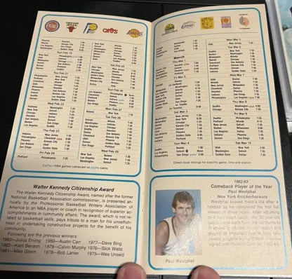 Vintage NBA Schedule Booklet featuring Kareem Abdul-Jabbar and Moses Malone graphics