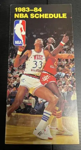 1983-84 NBA Schedule Booklet Pamphlet featuring Kareem Abdul-Jabbar and Moses Malone