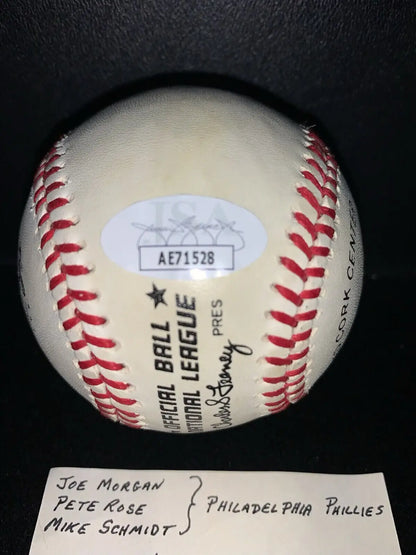 White baseball with red stitching and authentication sticker featuring Philadelphia Phillies, Pete Rose, Mike Schmidt