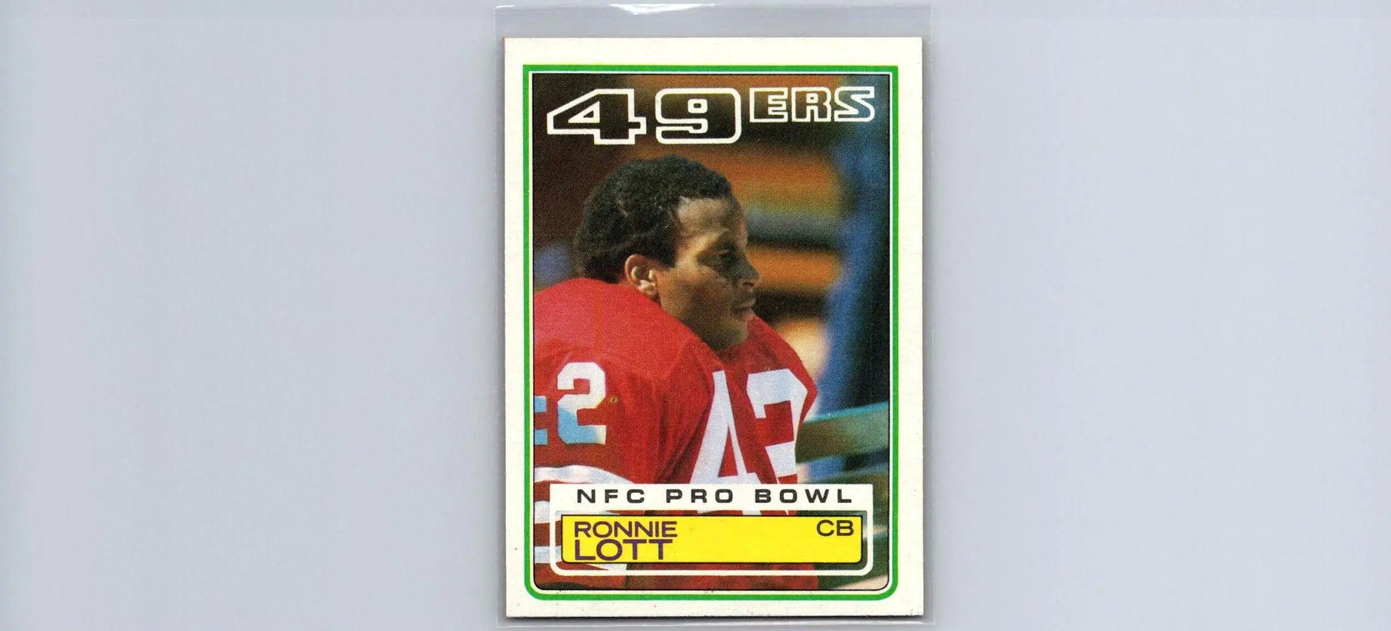 Ronnie Lott trading card from the 1983 Topps #168 collection featuring the football legend