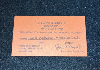 Orange Atlanta Braves press pass from 1984 Spring Training in West Palm Beach FL