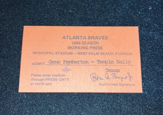 Orange Atlanta Braves press pass from 1984 Spring Training in West Palm Beach FL