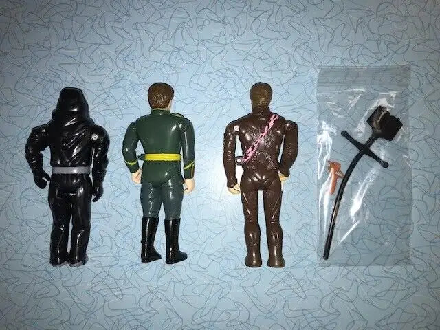 Vintage action figures from 1984 DUNE LJN with accessories, ideal for collectors of baseball cards