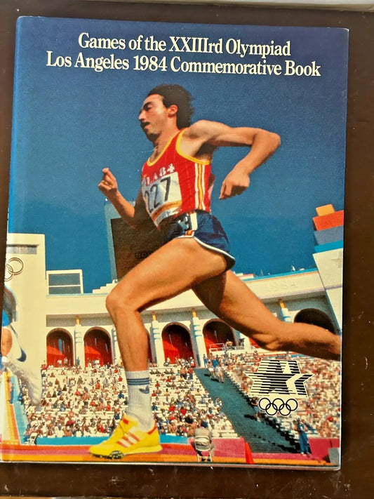 Commemorative hardcover book for Los Angeles Olympics 1984 featuring a runner on the cover