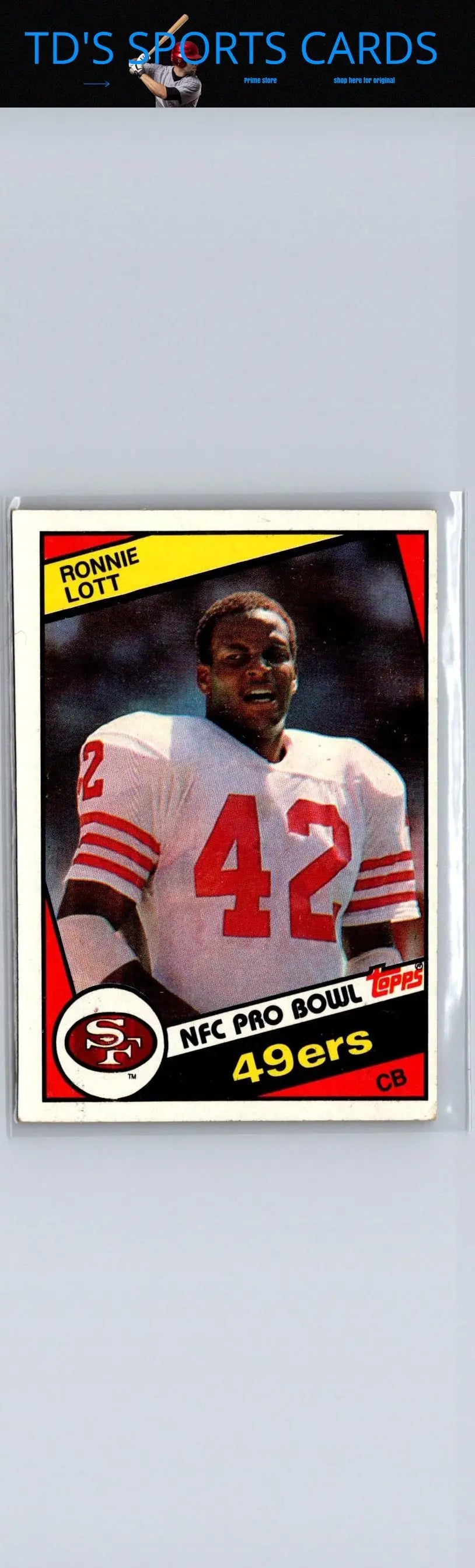Ronnie Lott trading card from 1984 Topps #357 featuring NFL legend Ronnie Lott