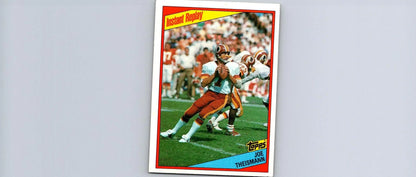 Joe Theismann 1984 Topps #391 trading card featuring the NFL legend’s iconic image