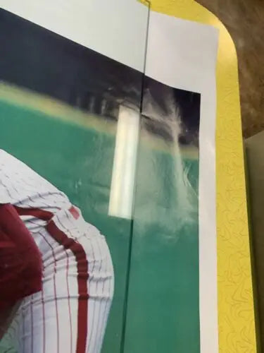 Framed Al Oliver Sports Illustrated poster, a rare collectible for trading card enthusiasts