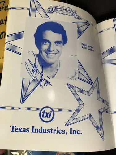 Autographed Rafael Septien Dallas Cowboys program featuring Tony Dorsett and Dallas cheerleaders