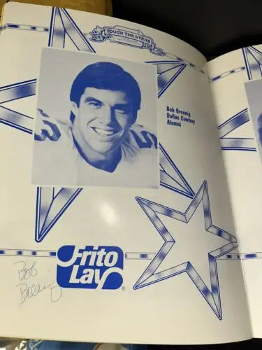 Autographed Dallas Cowboys alumni page featuring Tony Dorsett and more signatures