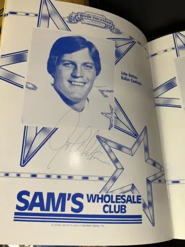 Autographed John Dutton page from 1985 Dallas Cowboys Touch the Stars Program