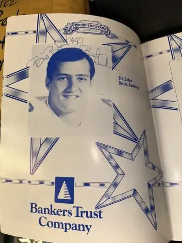 Autographed Bill Bates page from 1985 Dallas Cowboys Touch the Stars Program with Dorsett signatures