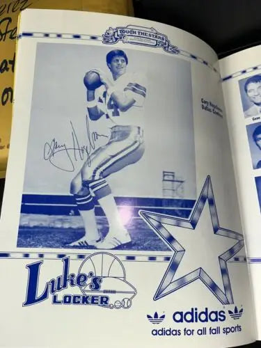 Autographed advertisement for 1985 Dallas Cowboys program featuring Tony Dorsett signatures