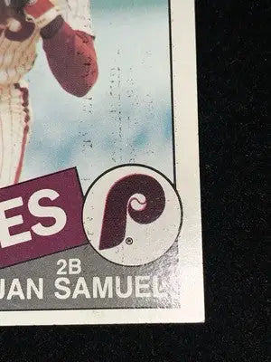 Worn 1985 Topps Juan Samuel Philadelphia Phillies baseball card with blank back vintage collectible
