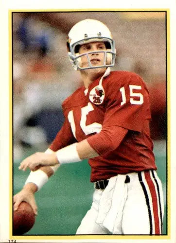 Original gloss Topps Stickers featuring Neil Lomax football player in uniform