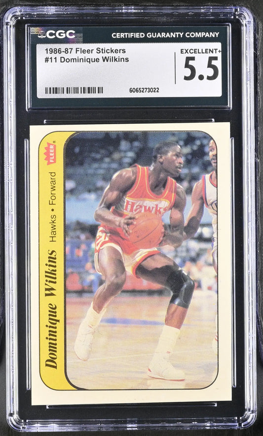 1986-87 Fleer Basketball Sticker #11 Dominique Wilkins CGC 5.5 Excellent+ - Sports Cards