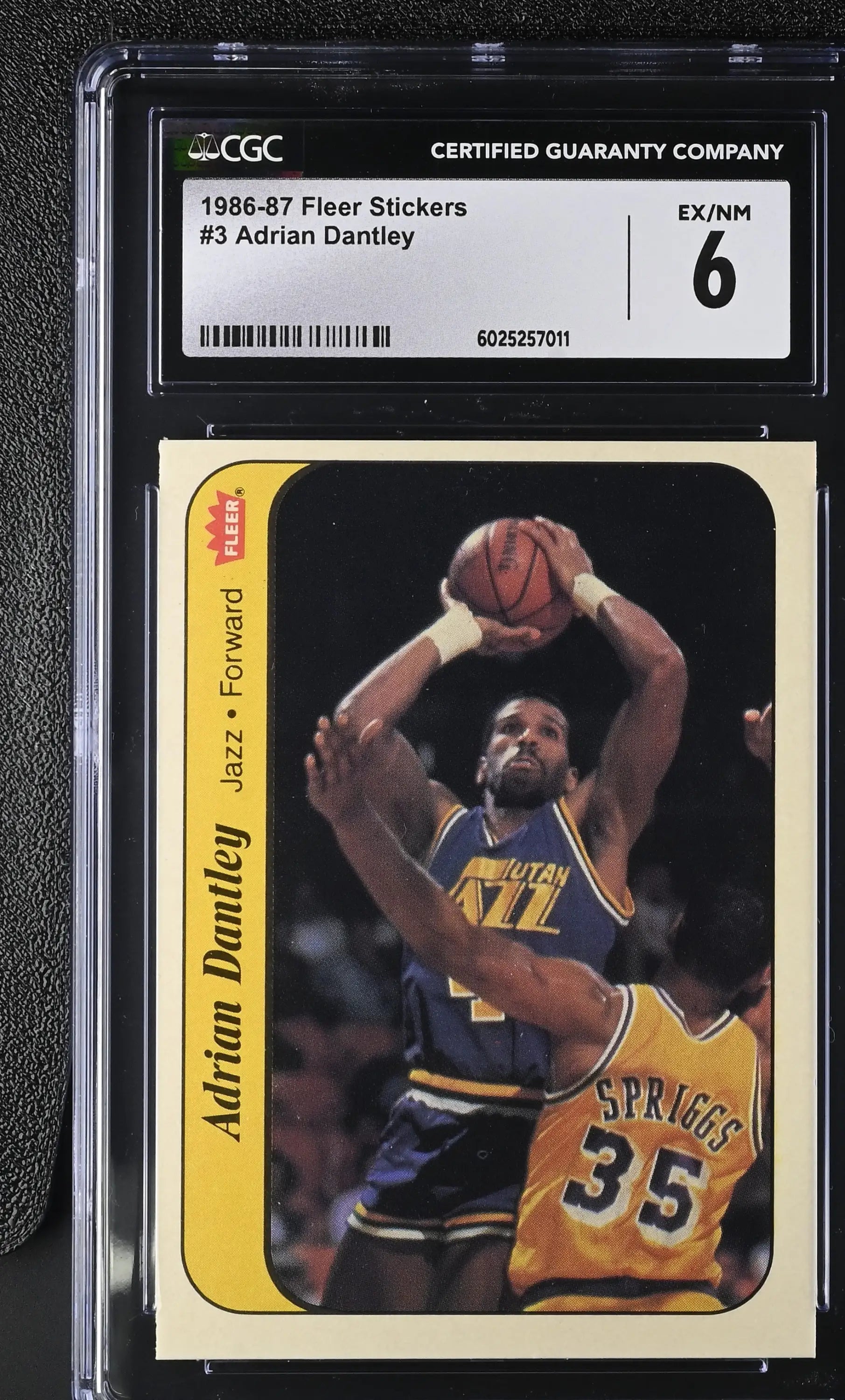 Graded Adrian Dantley Fleer basketball card from 1986-87 Fleer Stickers series