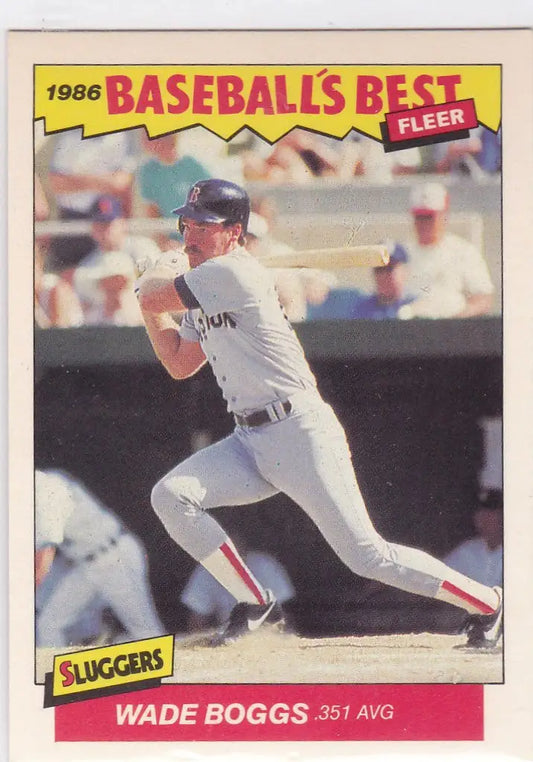 Baseball card of Wade Boggs mid-swing in white uniform, ideal for trading cards collectors