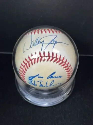Autographed 1986 MLB Rookies ball in display case, perfect for baseball card collectors