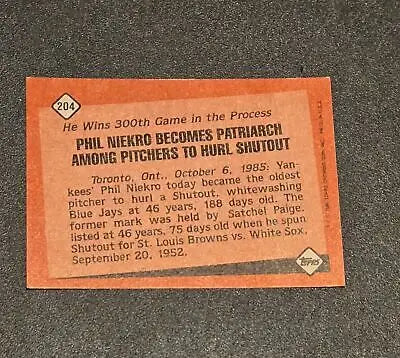Baseball card back of 1986 Topps Phil Niekro Niekro Baseball Card featuring stats