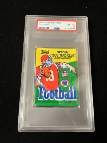 Graded 1986 Topps Football Wax Pack featuring Jerry Rice and Reggie White rookie cards