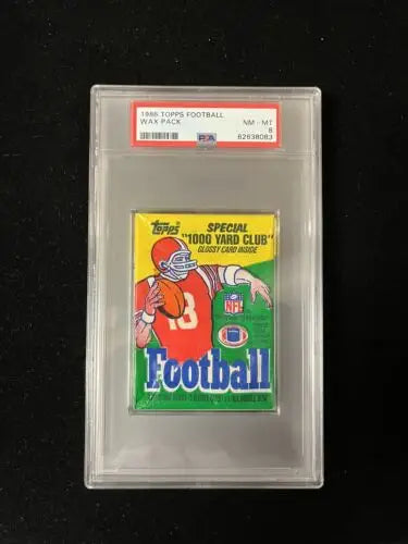 Graded 1986 Topps Football Wax Pack featuring Jerry Rice and Reggie White trading cards