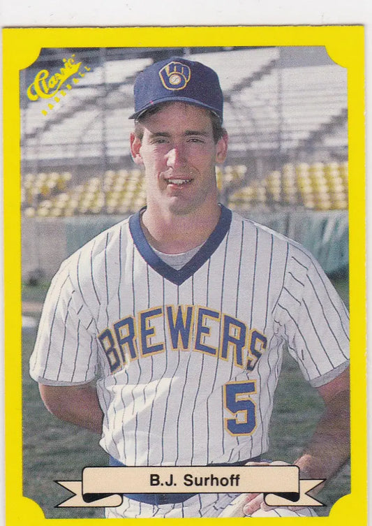 Baseball trading card featuring B J Surhoff in yellow Milwaukee Brewers uniform, classic baseball collectible